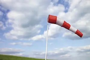 Cloudy Sky Imprime: Windsock in front of clouds in the sky