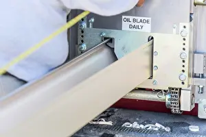 Rain Gutter Installation Imprime: Worker Measuring Rain Gutter Processing Through Seamless Shaping Machine