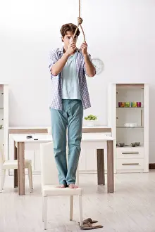 Young Adult Depression Imprime: Young man preparing to commit suicide by hanging